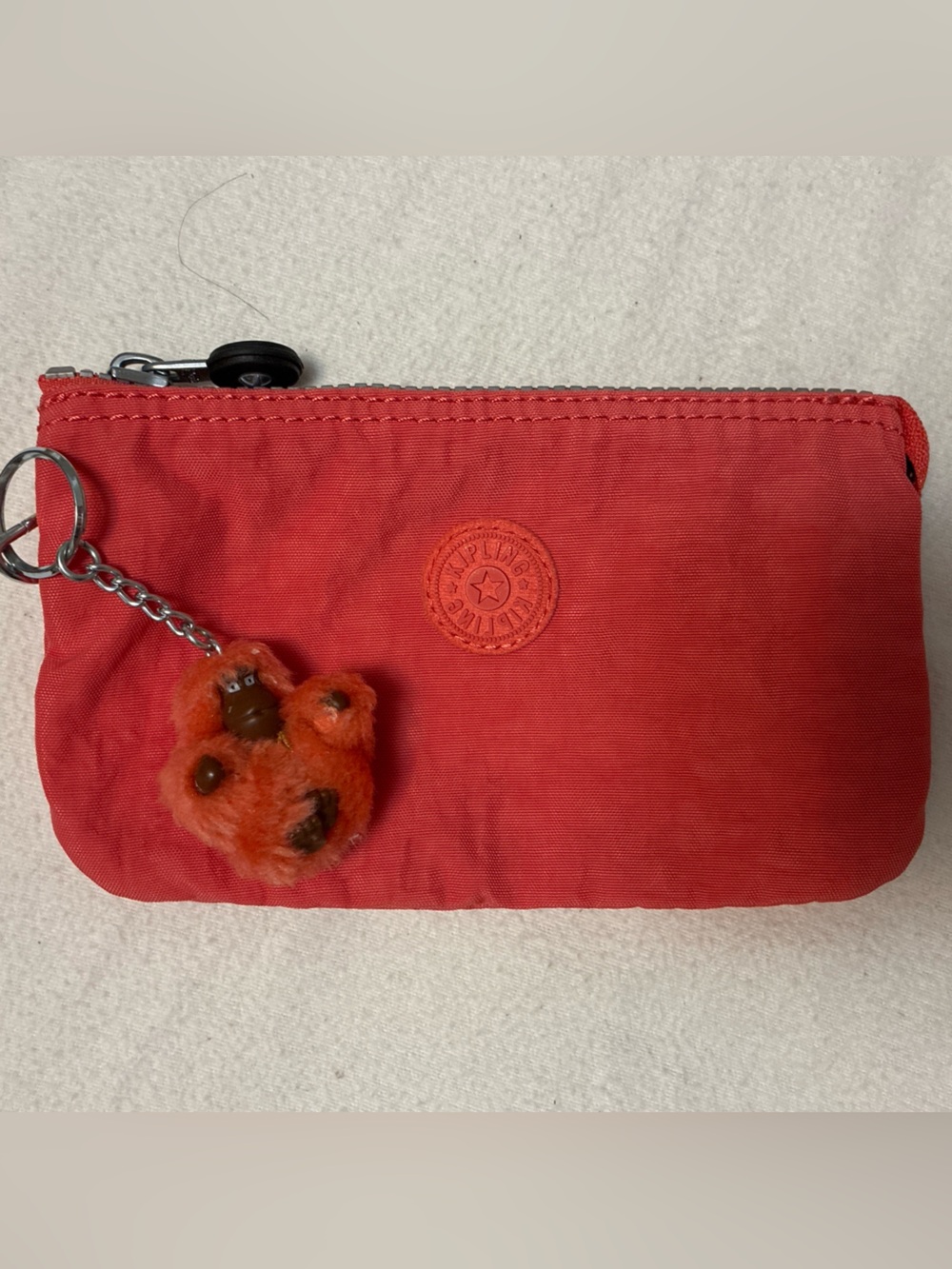 Kipling Coral Red Zip Pouch with Monkey Charm